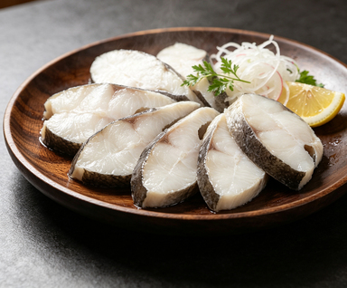 Delicate Seafood Delight: Freshly Sliced Fish Fillets