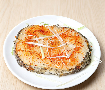 Delicious Steamed Fish Fillet with Chili and Ginger Garnish
