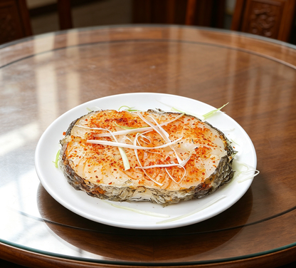 Delicious Steamed Fish Fillet with Chili and Ginger Garnish